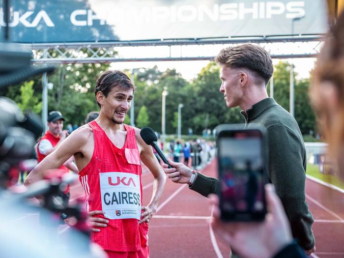 Lloyd interviewing an athlete at the UKA Championships